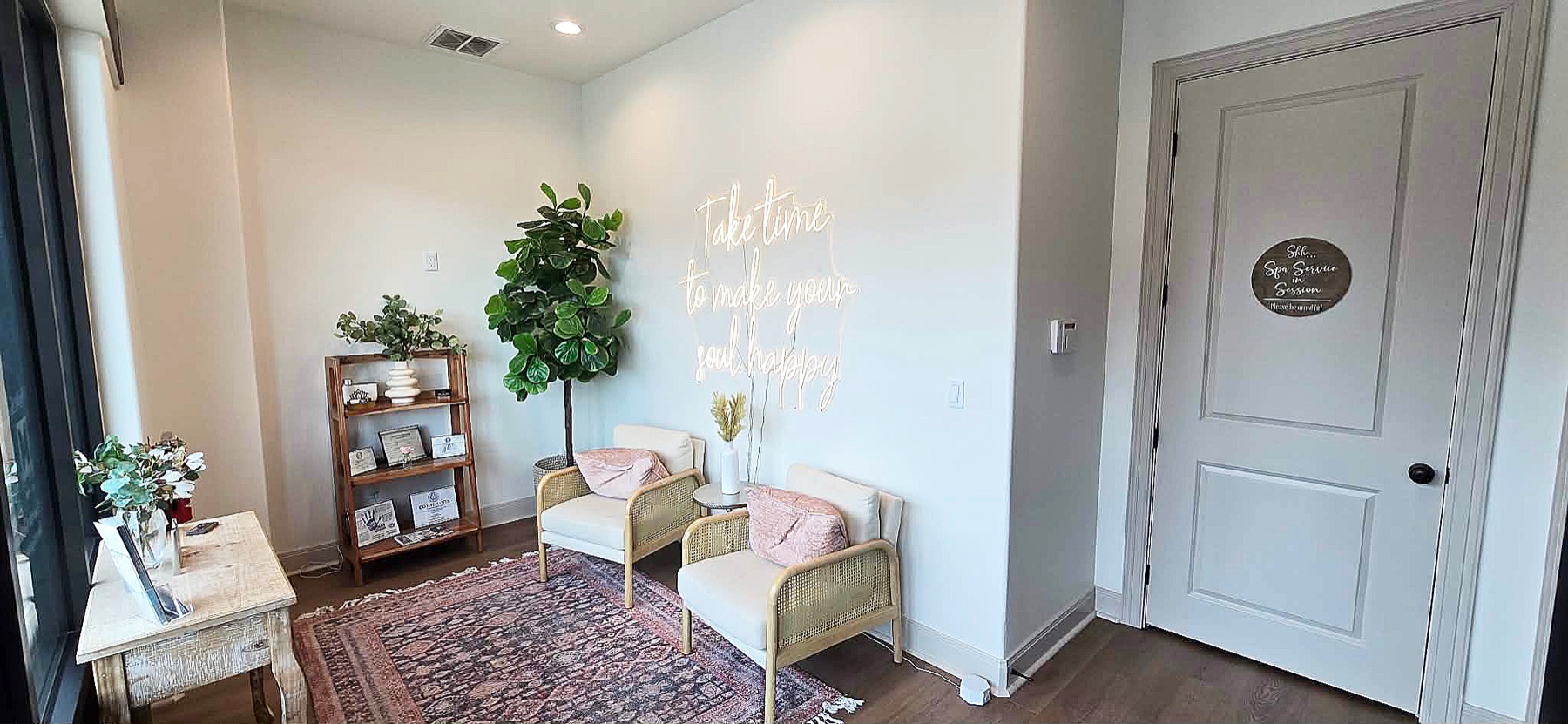 Reception and retail shelf with professional skincare products at Hello Beautiful